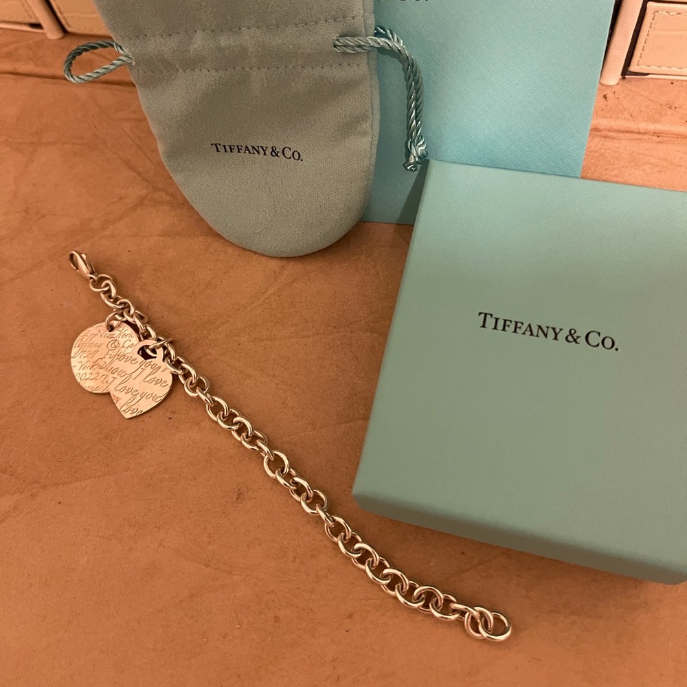 Tiffany &CO charm bracelet with 2 Charms